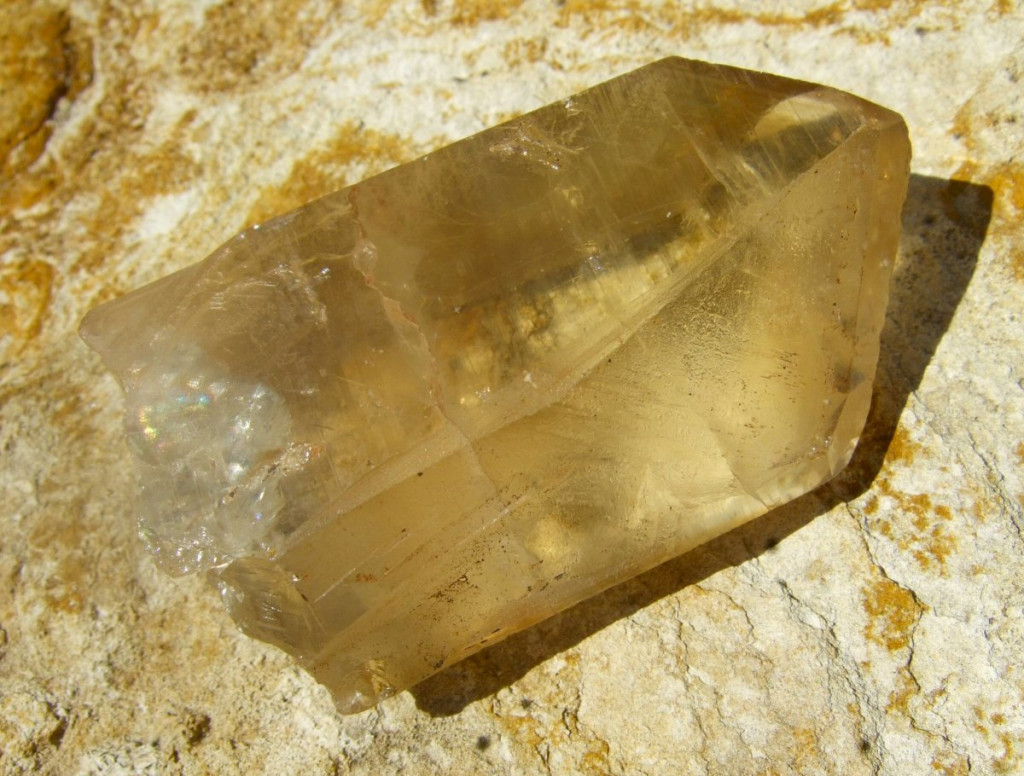 This is a natural citrine with a classic point shape and light tea color. 