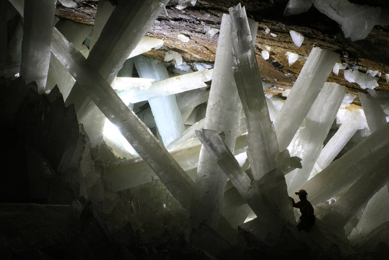 Gypsum crystals of the Naica cave. Note person for scale. 